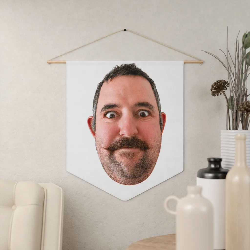 The pennant hung on a wall, our picture printed across it.