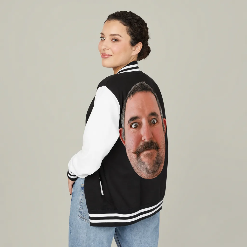 Someone wearing the letterman jacket, back to the camera, our picture printed big across the back.