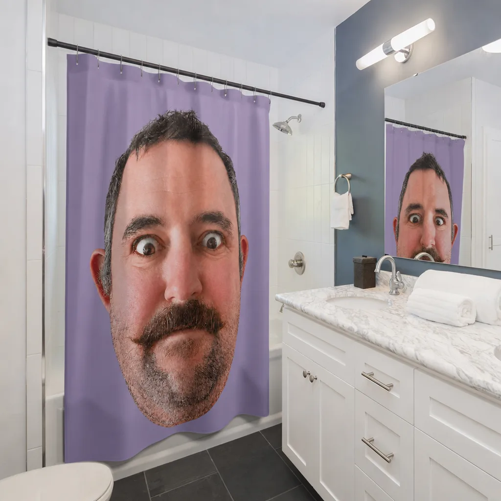 The shower curtain hung in a bathroom, our picture printed the full height of it.